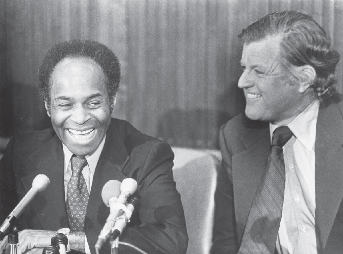 Nelson smiling, with Teddy Kennedy